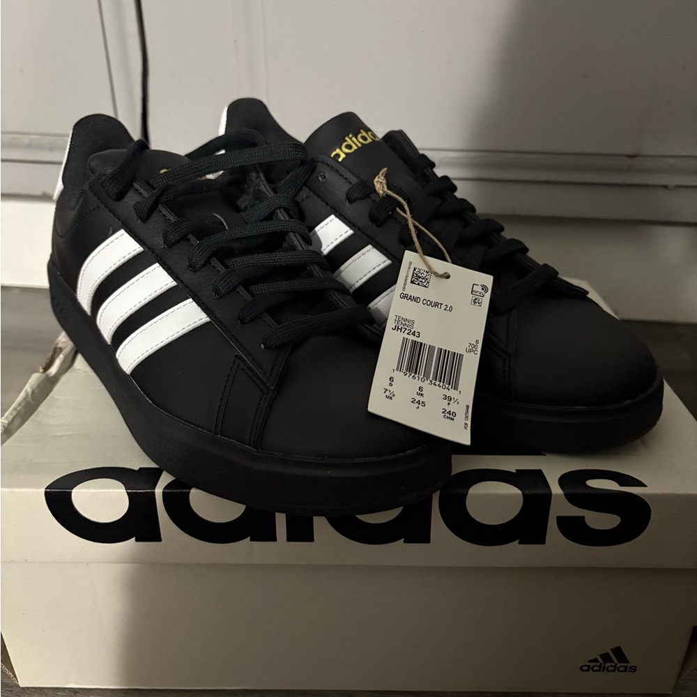 Adidas Black and White Sneakers with Yellow Logo